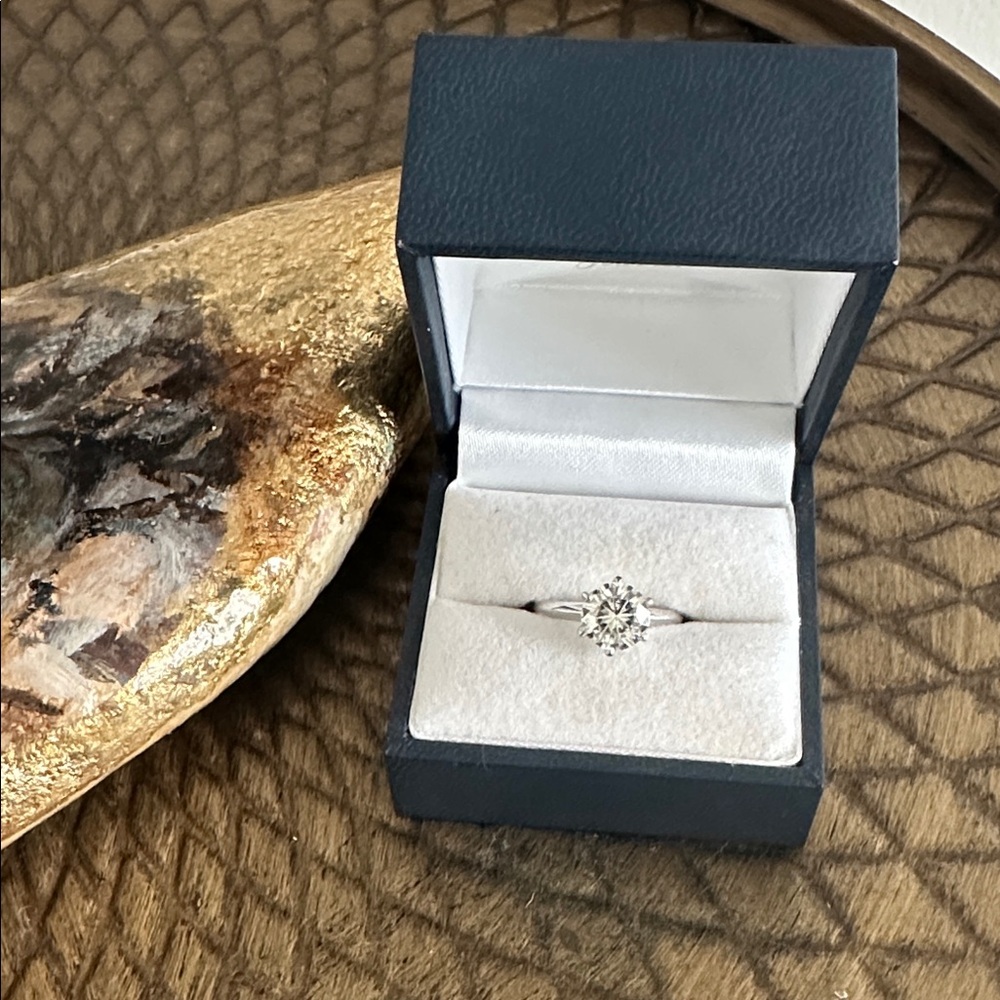 Charles and Colvard Forever Brilliant 1.9 carat solitaire engagement ring.